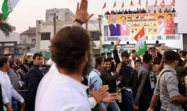 Rahul Gandhi Blew Kisses And Waved At The People Standing At The Rooftop Of The BJP Office.